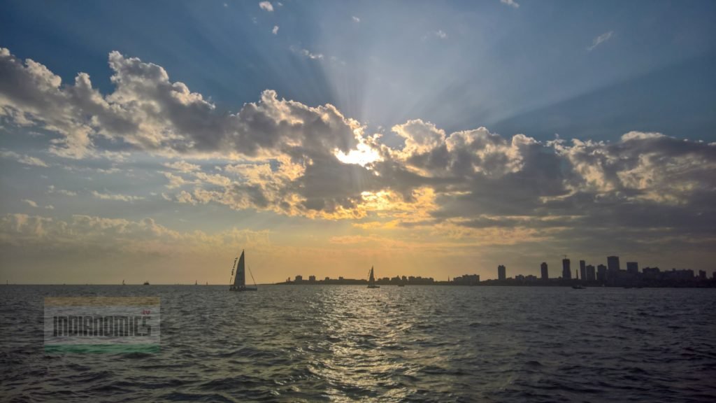 Yacht aganist Mumbai Skyline